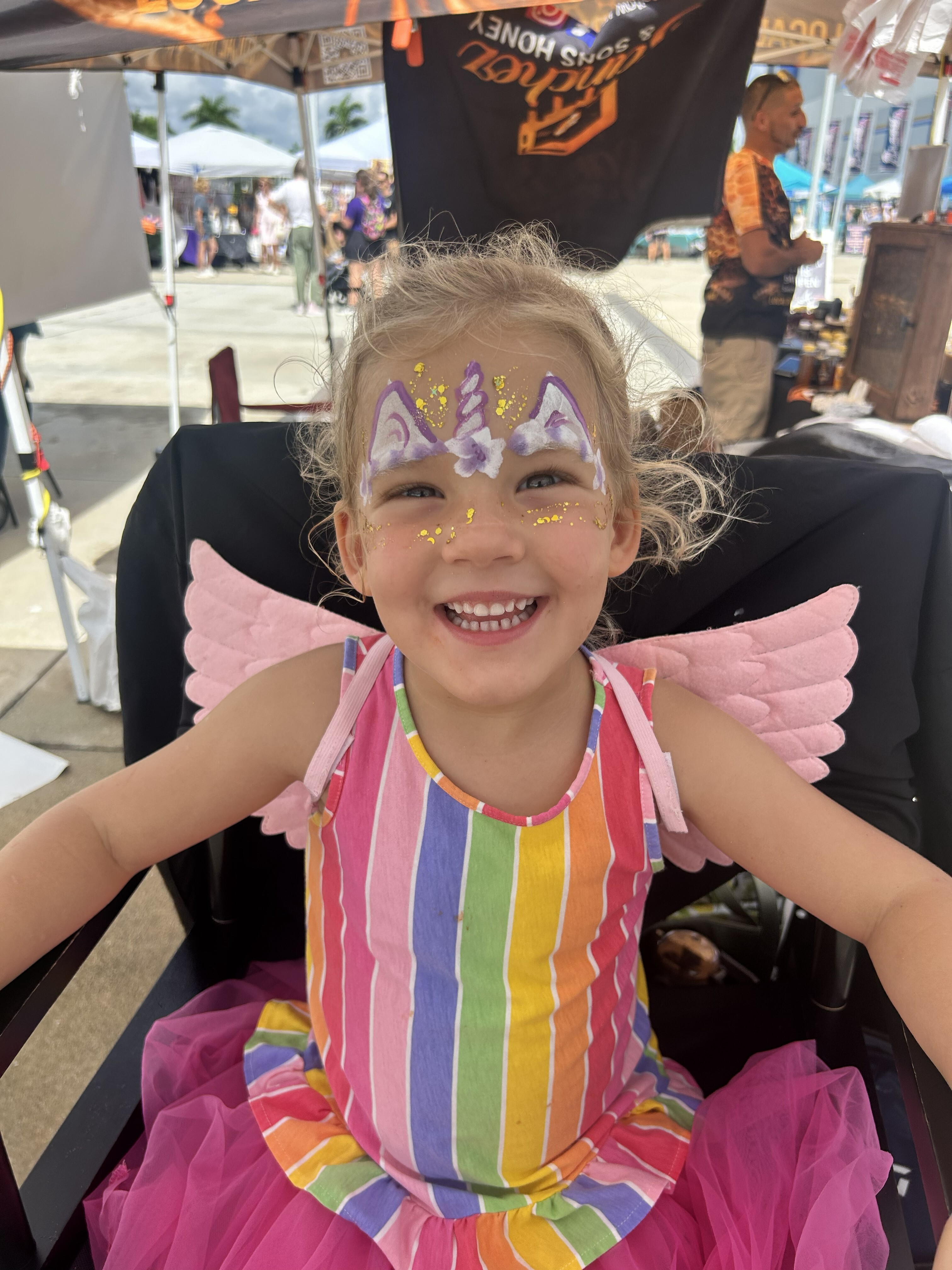 Purple glitter unicorn facepaint