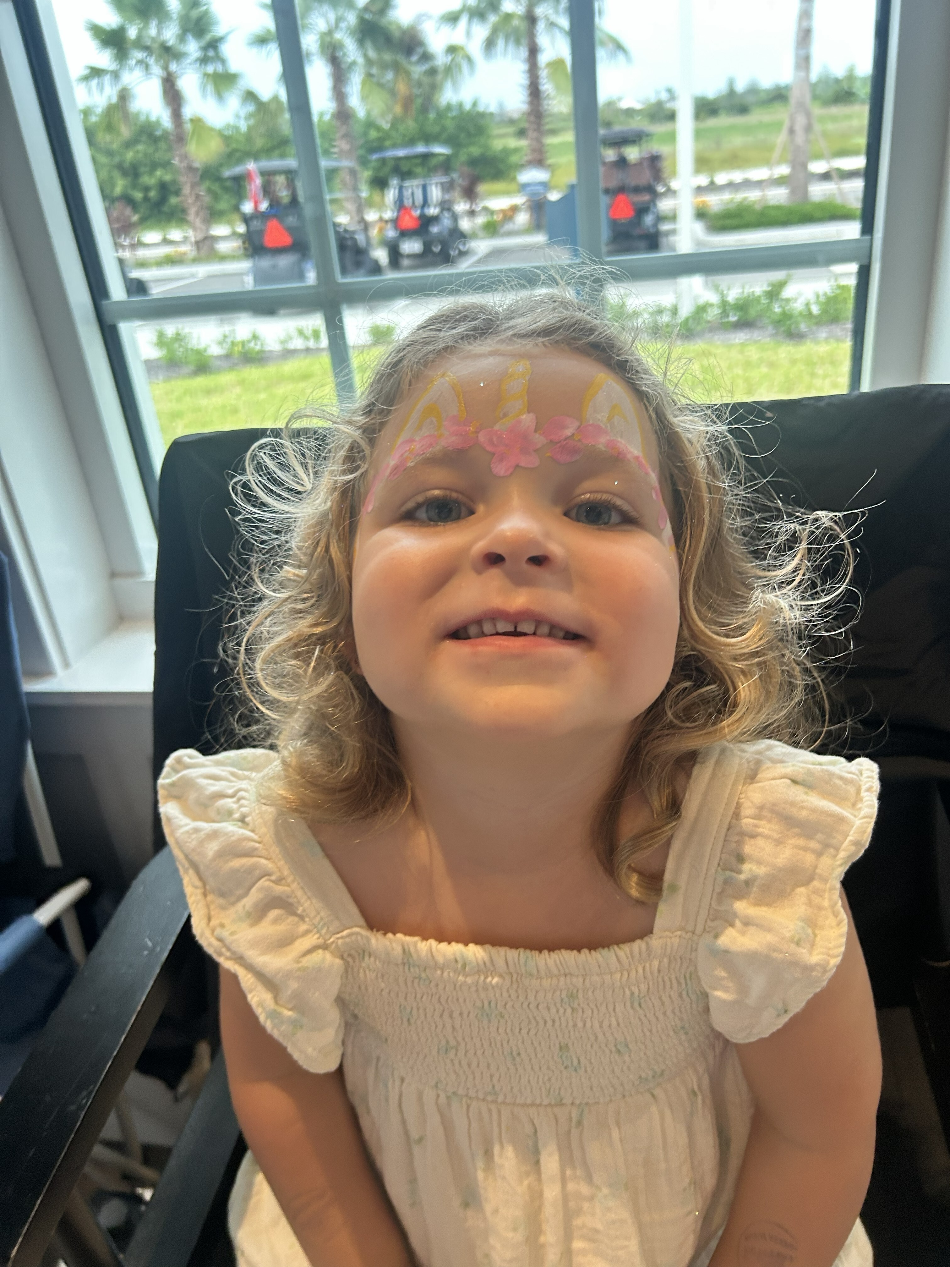 pink and yellow unicorn facepaint