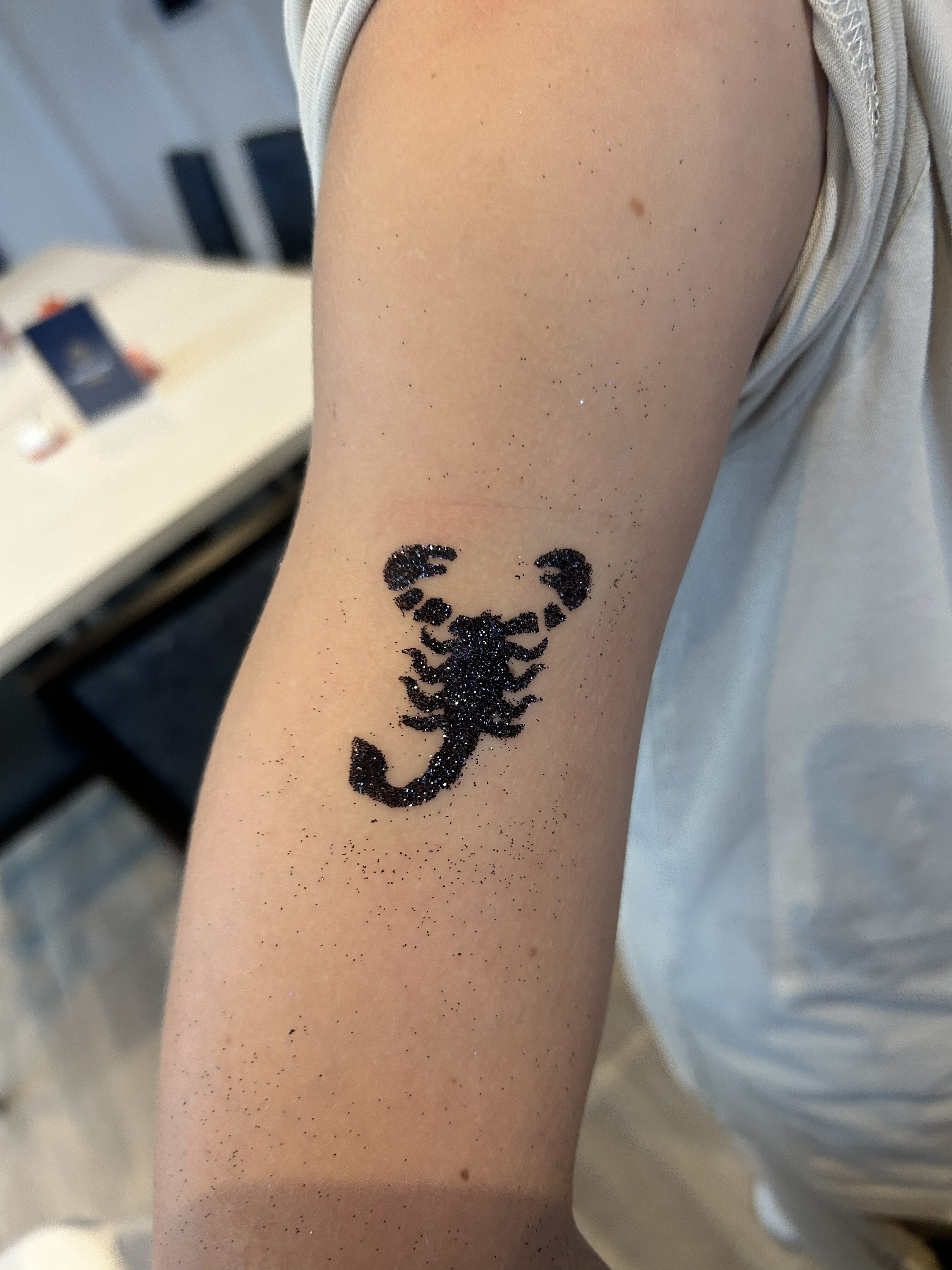 scorpian glitter tattoo